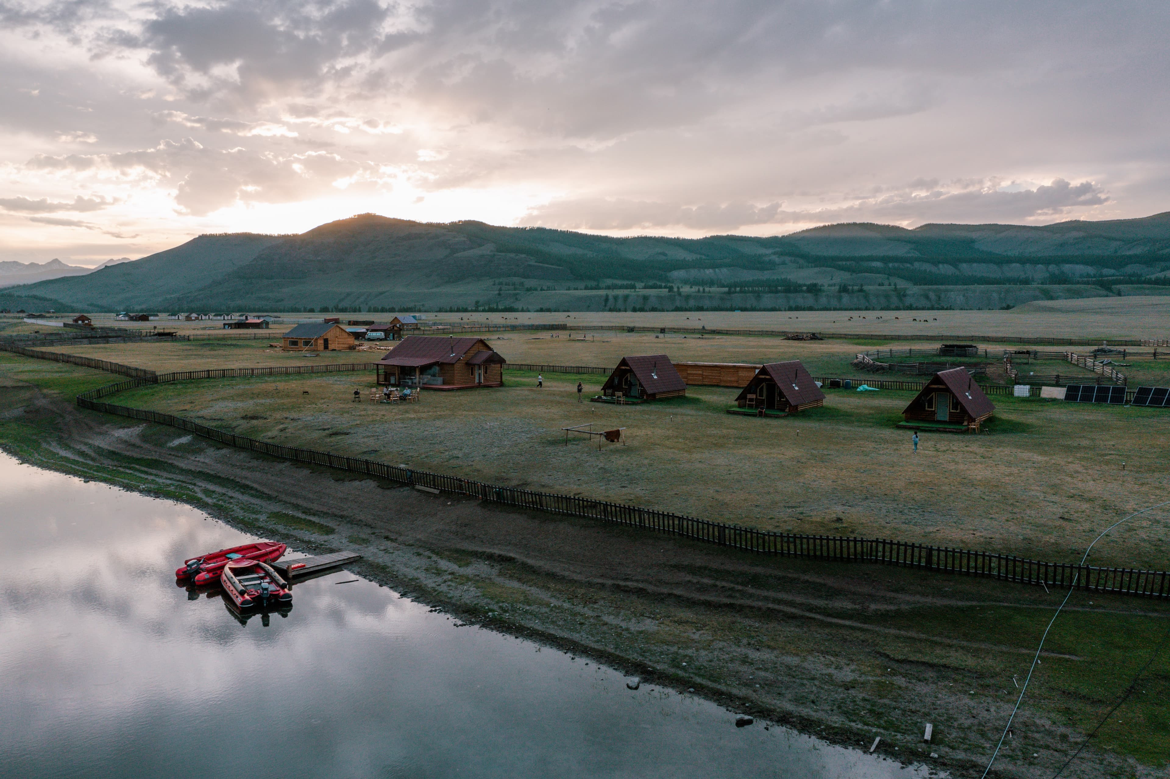 Remote tented camp on the Mongolia taimen expedition at sunset